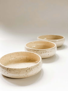 3 Low profile bowls wheel thrown in a cream and brown speckled clay