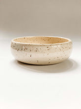 Load image into Gallery viewer, Low profile bowl wheel thrown in a cream and brown speckled clay