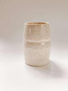 Tall, two sectioned wheel thrown vase in cream and brown speckled clay