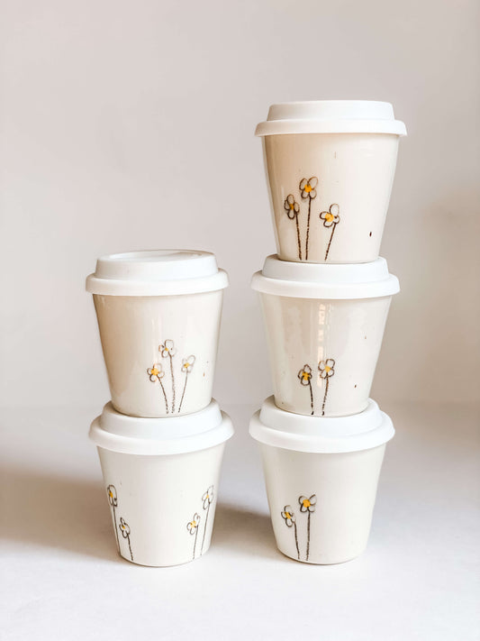 8oz lidded pottery coffee daisy design to go cups stacked 2 by 3