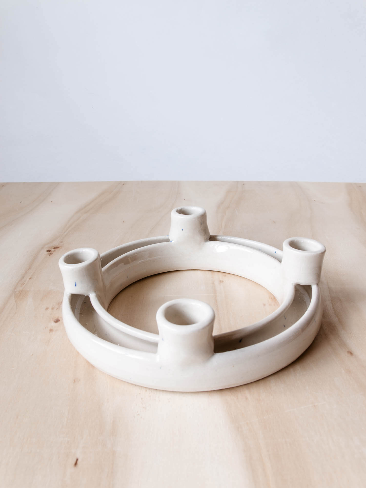 Advent wreath candle holder, empty with a trough for water to hold living greenery