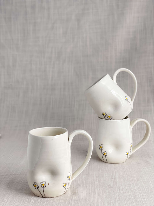 Indented Daisy Mugs in White Porcelain