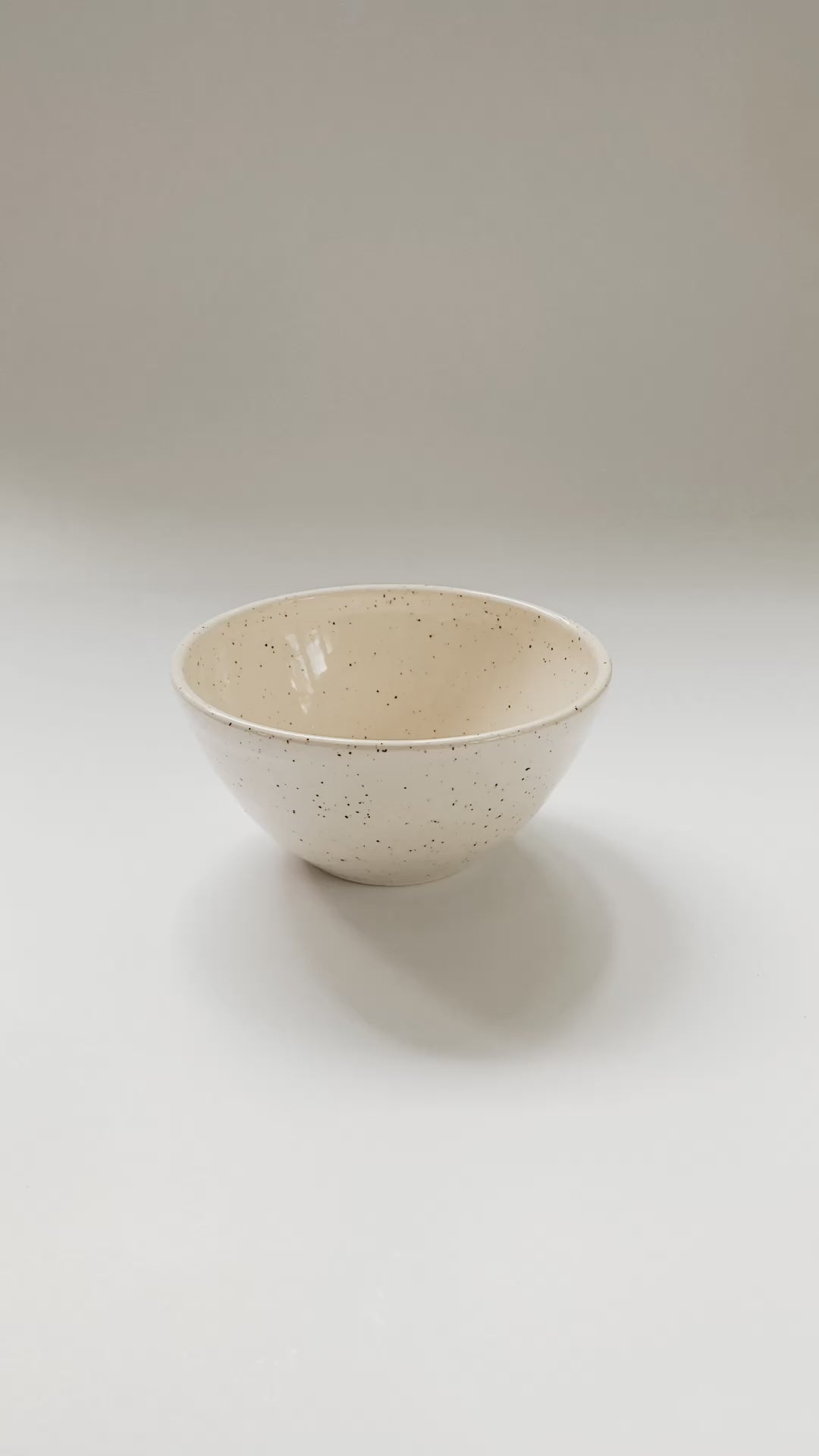 Large speckled bowl, wheel thrown